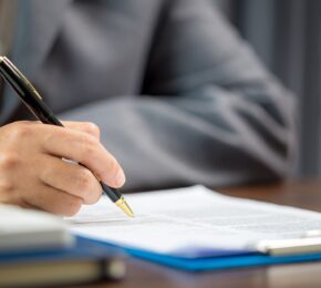 Woman Checking Documents