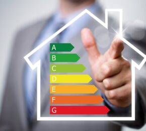 Businessman pointing to energy chart